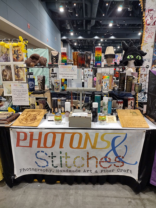 We have our own fandoms, and unlike other tumbler makers, we understand your passions.We pride ourselves on being self-proclaimed nerds and geeks. We aim to make your fandom come to life through custom, handcrafted tumblers. Image from Artist Alley, GalaxyCon Raleigh 2022